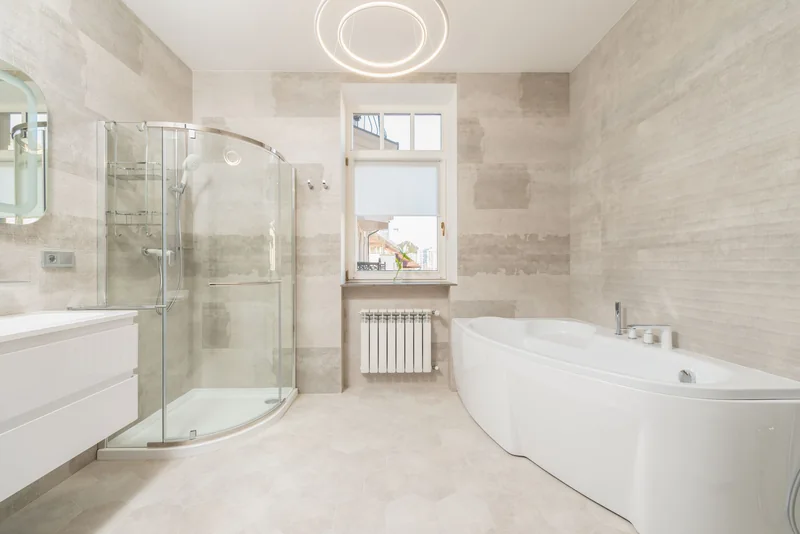A bright modern bathroom with a window